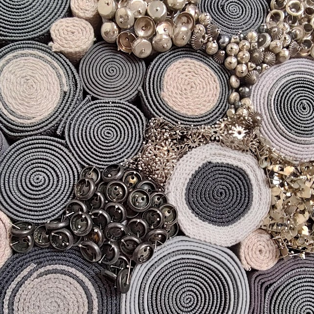 Detail of textiles as seen from ends.